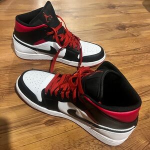 Red and black Jordon 1s